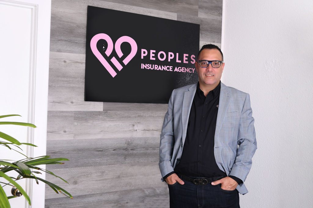 Jose Maurisset at Peoples Insurance Agency Entrance